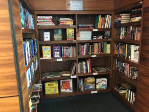 A photo of the book nook at the Northside Library stocked by the Friends of The Santa Clara City Library Foundation and Friends