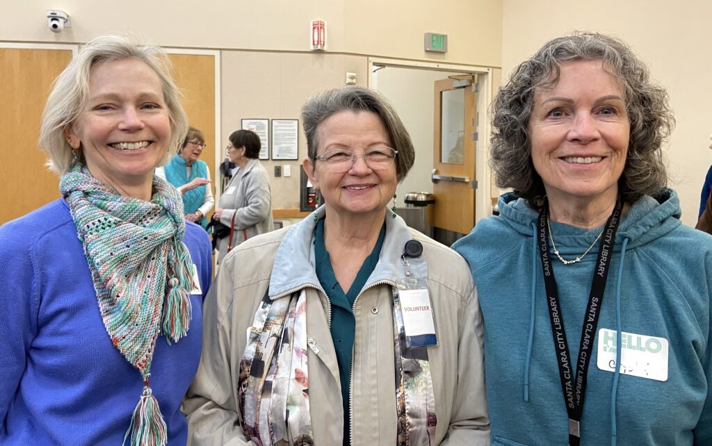 Three smiling volunteers being celebrated at the Santa Clara City Library Foundation and Friends Volunteer Appreciation event